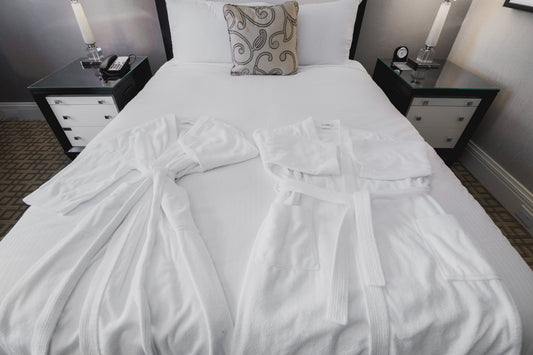 Bed with bath robes laid out